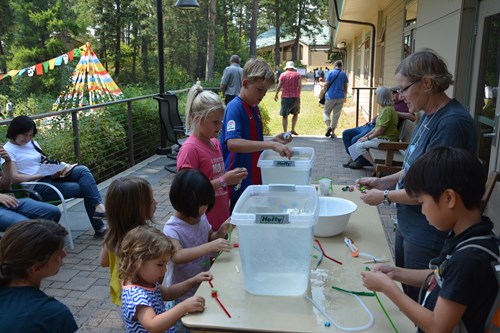 Young FLBS open house attendees race plankton in a fun kids activity