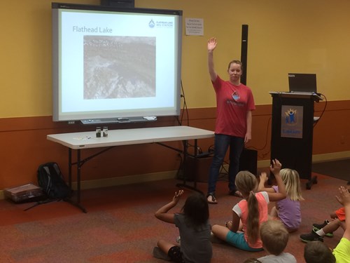 Anne McDarris teaches local children about the Flathead Lake Biological Station at a public library in Polson over the summer