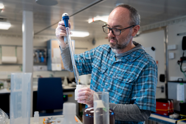 FLBS Scientist Matt Church conducts experiment in research laboratory