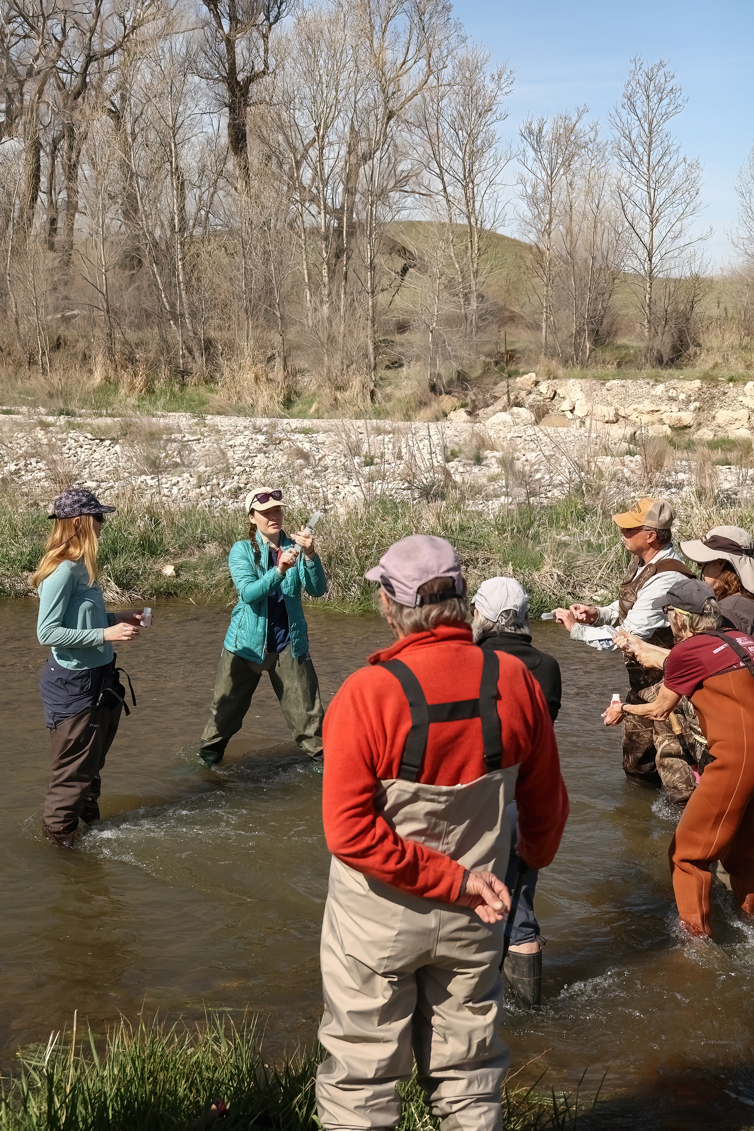 Central Montana Resource Council group being trained by Monitoring Montana Waters on collecting water samples.