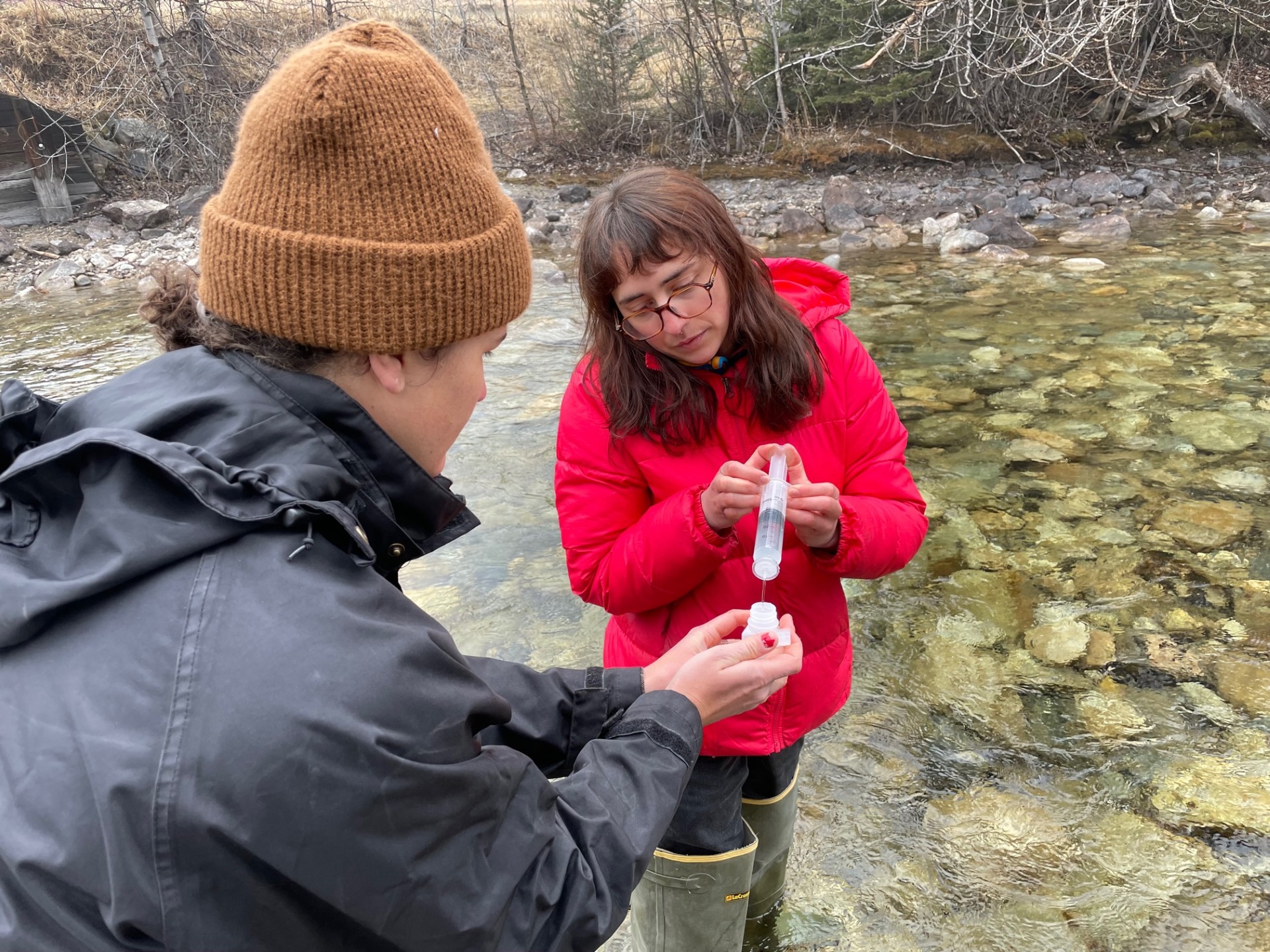 FLBS employees assist volunteers with water sampling