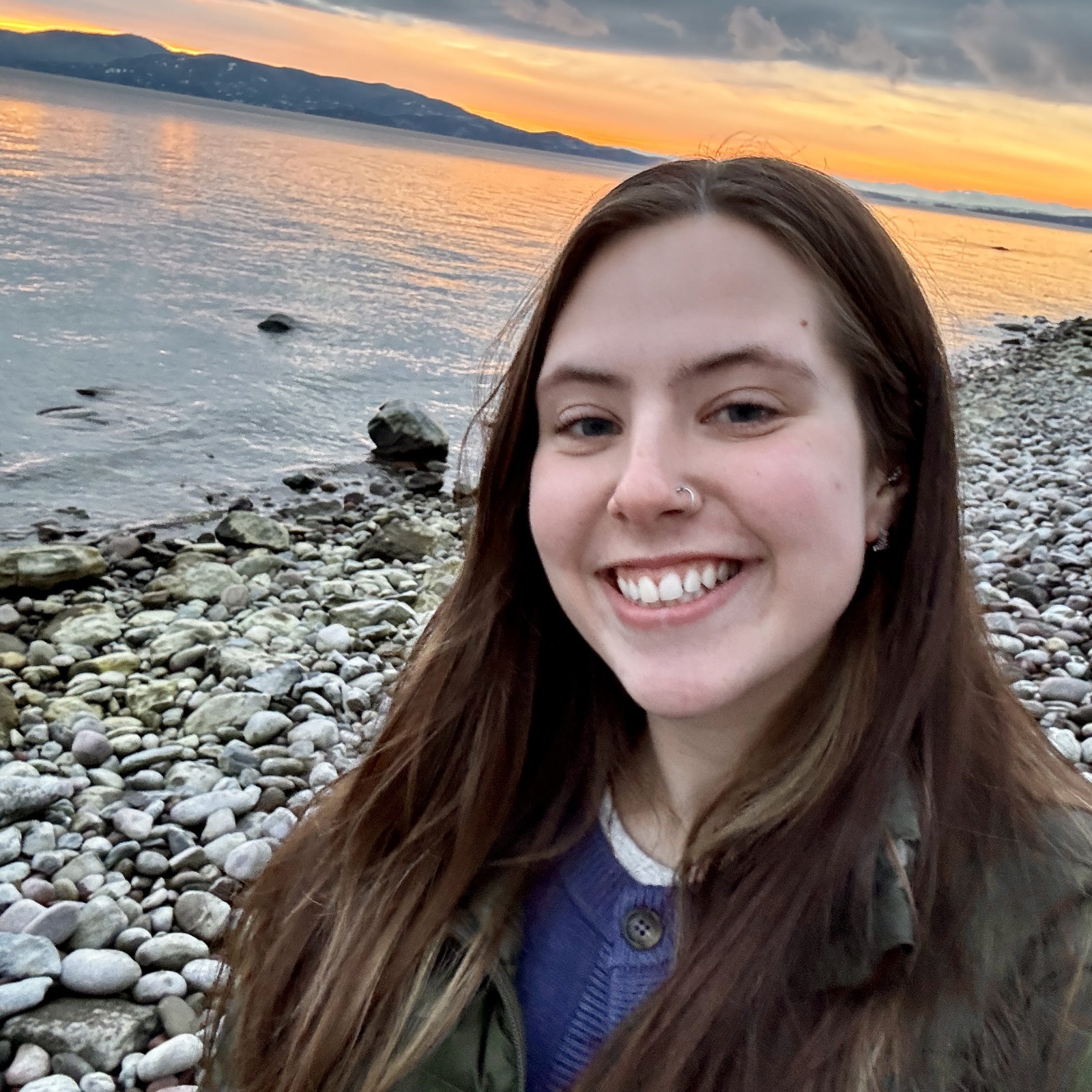 Emily McFarland by Flathead Lake at sunset