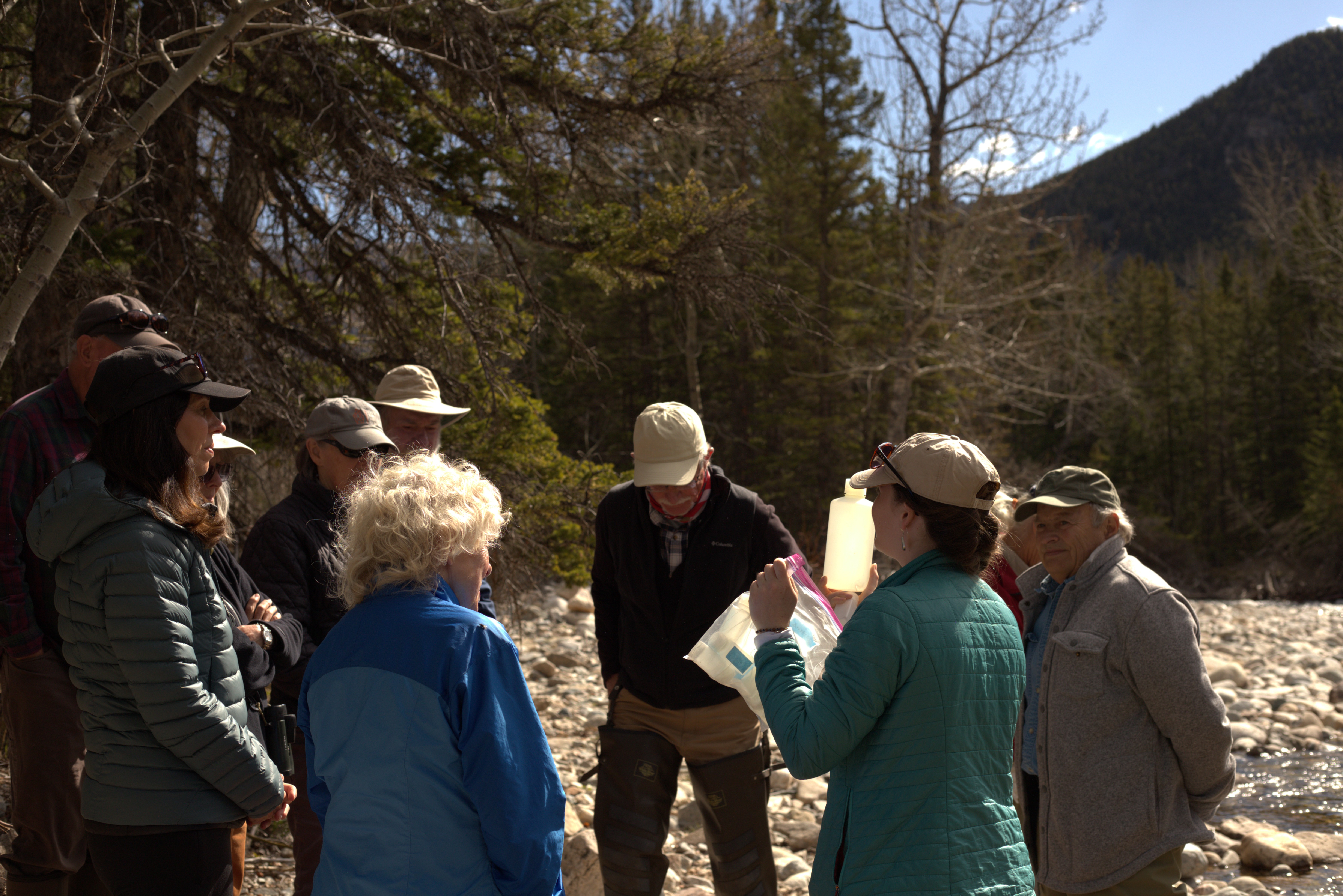 Callie Nelson instructing Carbon County Resource Council volunteers on how to collect unfiltered water samples.