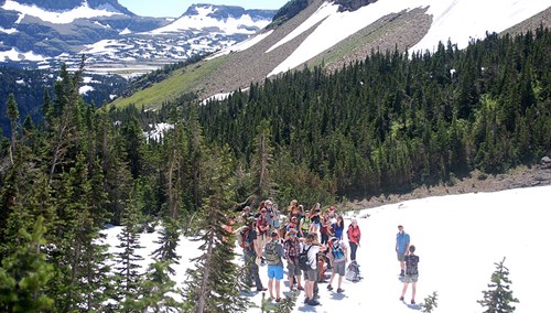 Field Ecology students stand on a Glacier snowfield during a field trip