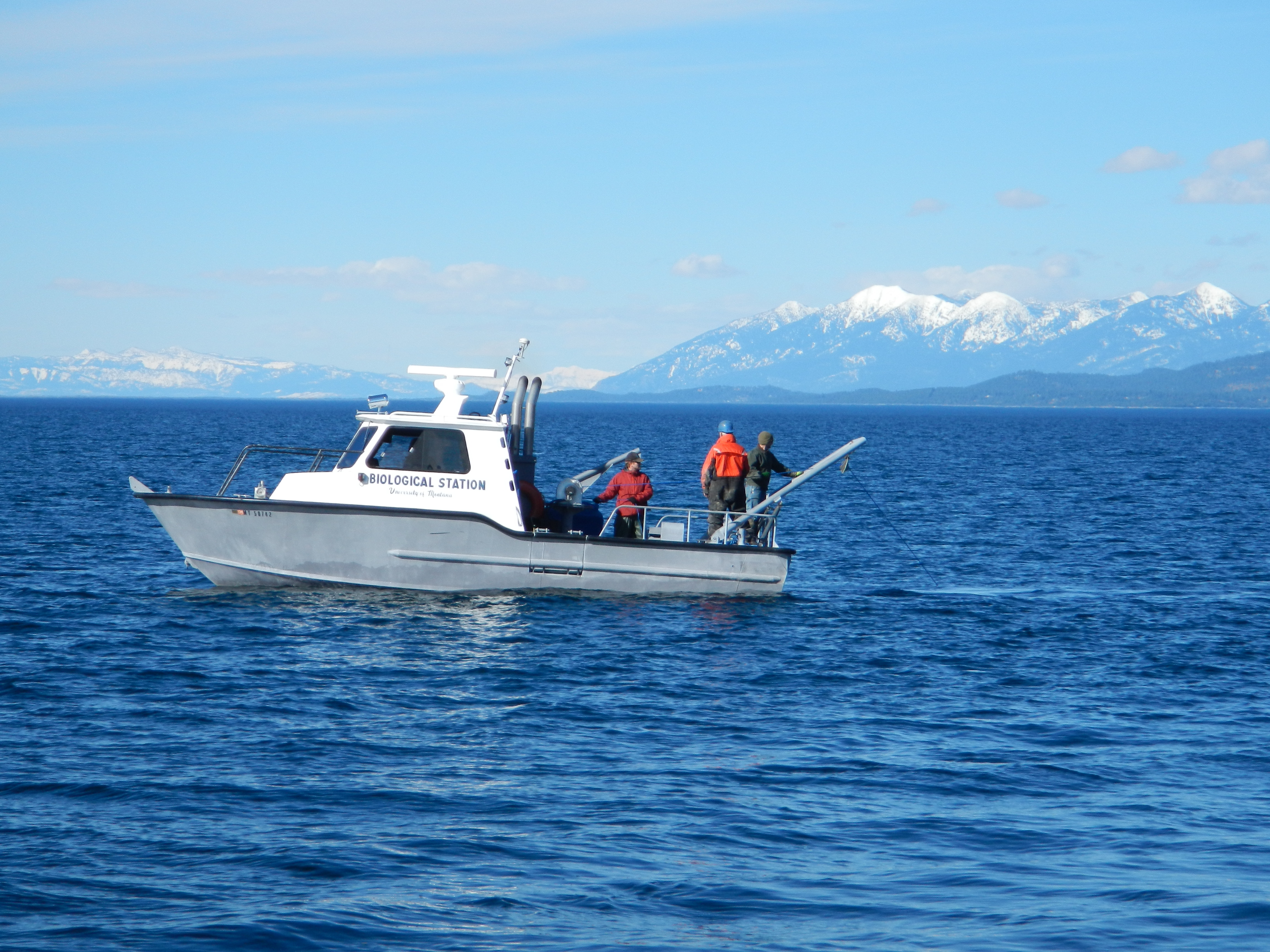 Sampling from the Jessie B with Whitefish Range in the background